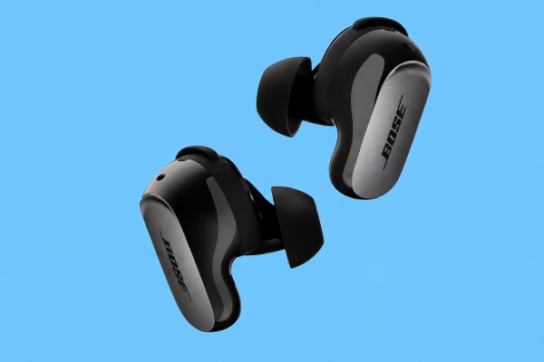 Bose QuietComfort Ultra Earbuds (2nd Gen) on a sky-blue background`
